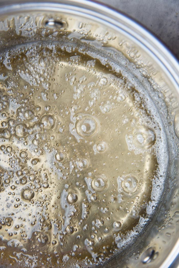 Homemade Peppermint Marshmallow recipe process - The sugar syrup bubbling at the right temperature in a saucepan.