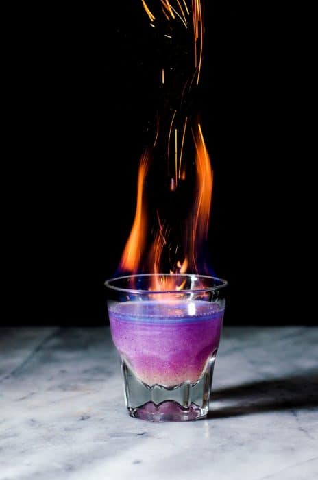 Phoenix Cocktail - An Elderflower and Gin Cocktail that is a Shimmery Color Changing Cocktail! Made with Butterfly pea Flower infused gin and a fruity, tangy, floral and sweet lemon Elderflower syrup. 