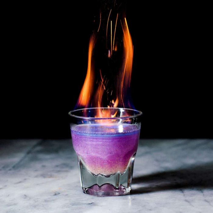 Phoenix Cocktail - An Elderflower and Gin Cocktail that is a Color Changing Shimmery Cocktail! Made with Butterfly pea Flower infused gin and a fruity, tangy, floral and sweet lemon Elderflower syrup. 