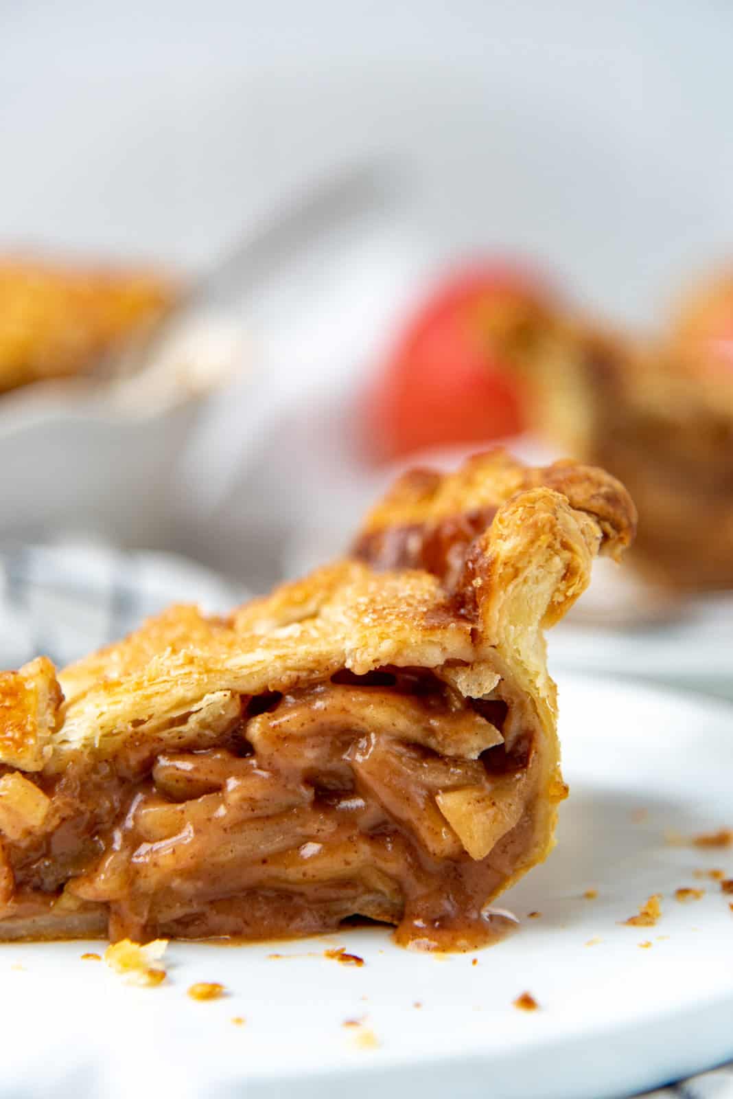 A close up of the cros section of the pie crust, showing flaky layers.