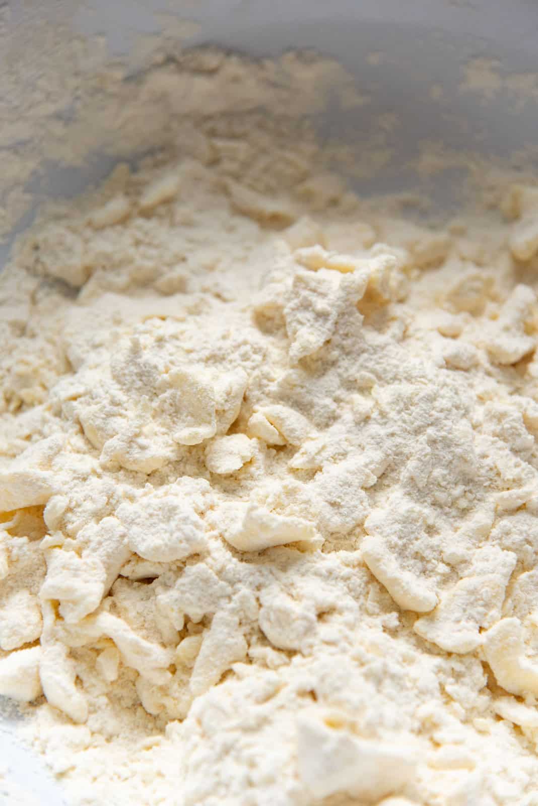 A close up of the pie dough, after the butter has been cut into the flour.