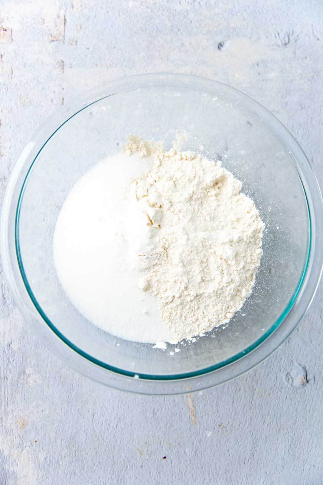 Sugar and flour in a large bowl.