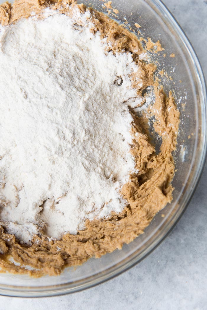 Making Craqueline for choux au craqueline - Add the flour to the butter sugar mix.
