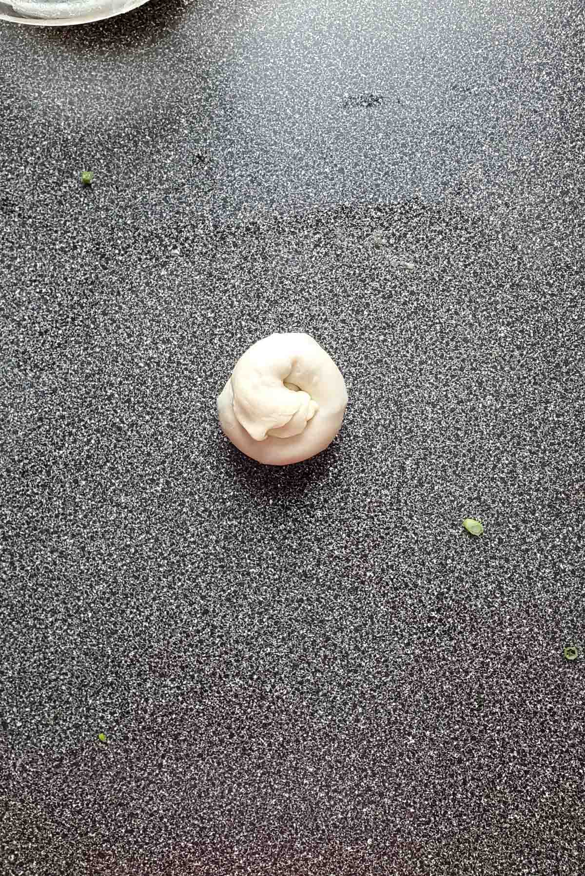 The dough after the log has been soiled into a spiral.