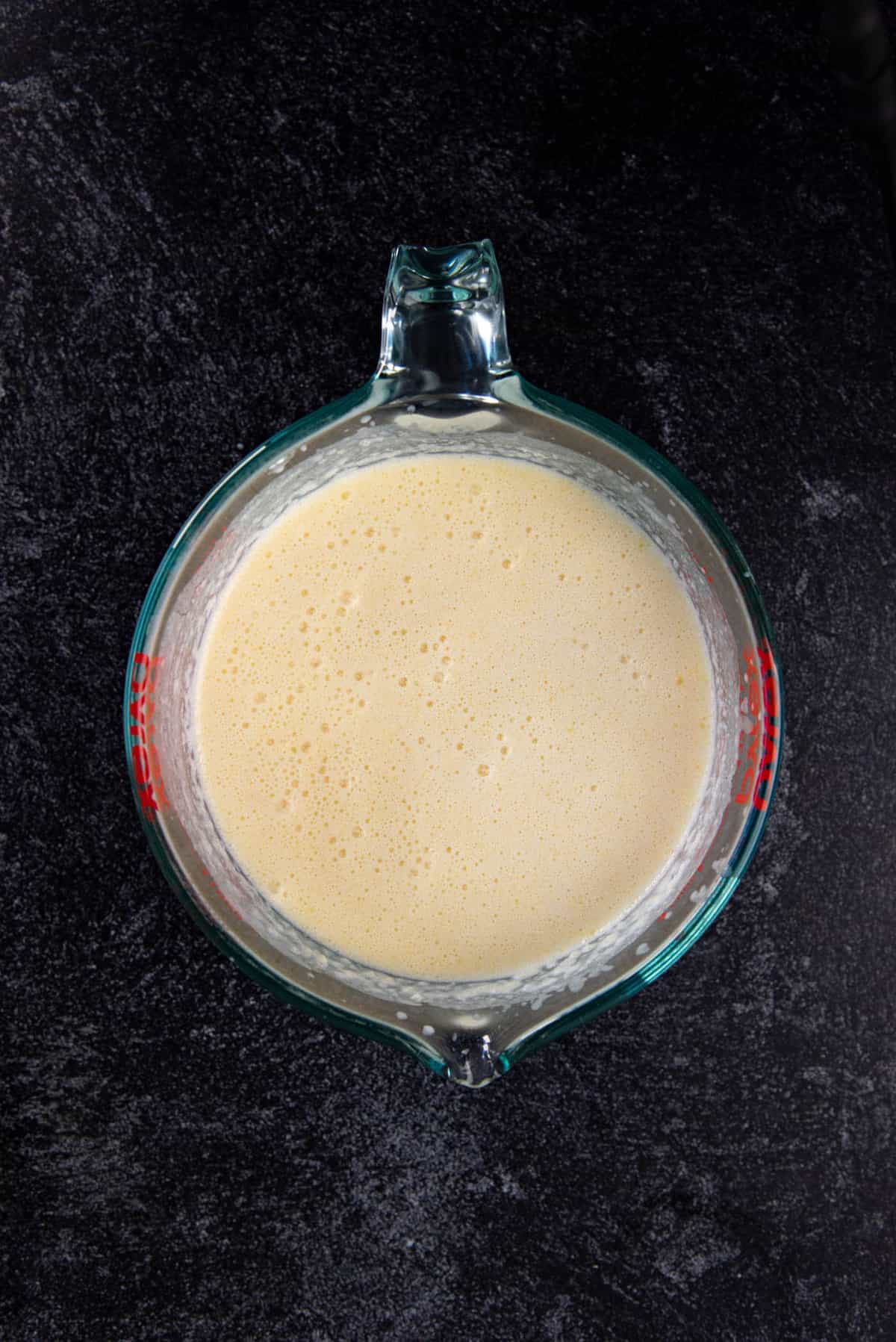 The wet ingredients mixed together in a large jug.