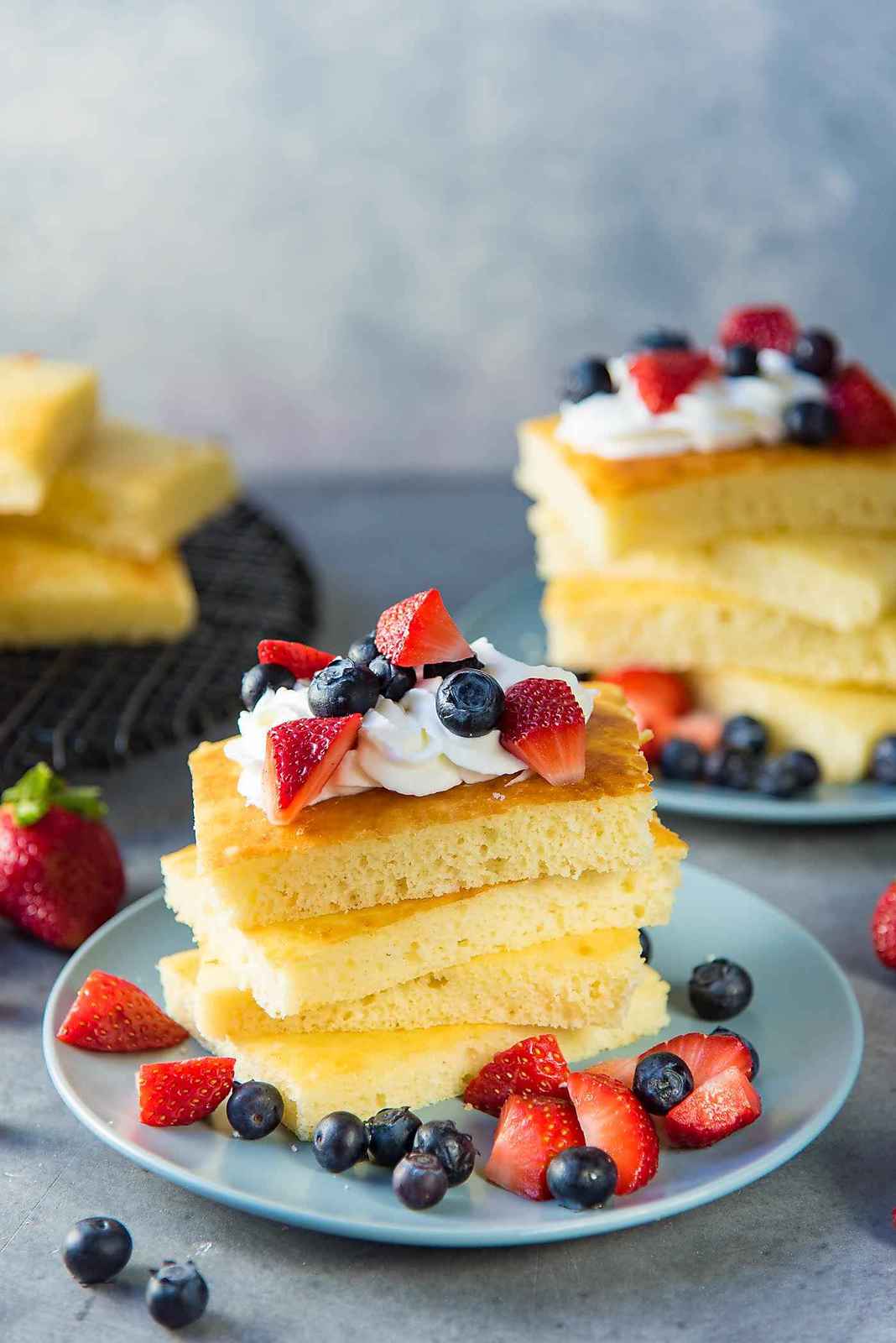 Sheet pan pancakes - Soft light and fluffy oven baked pancakes for breakfast or brunch. Perfect for a crowd, and easy to make.