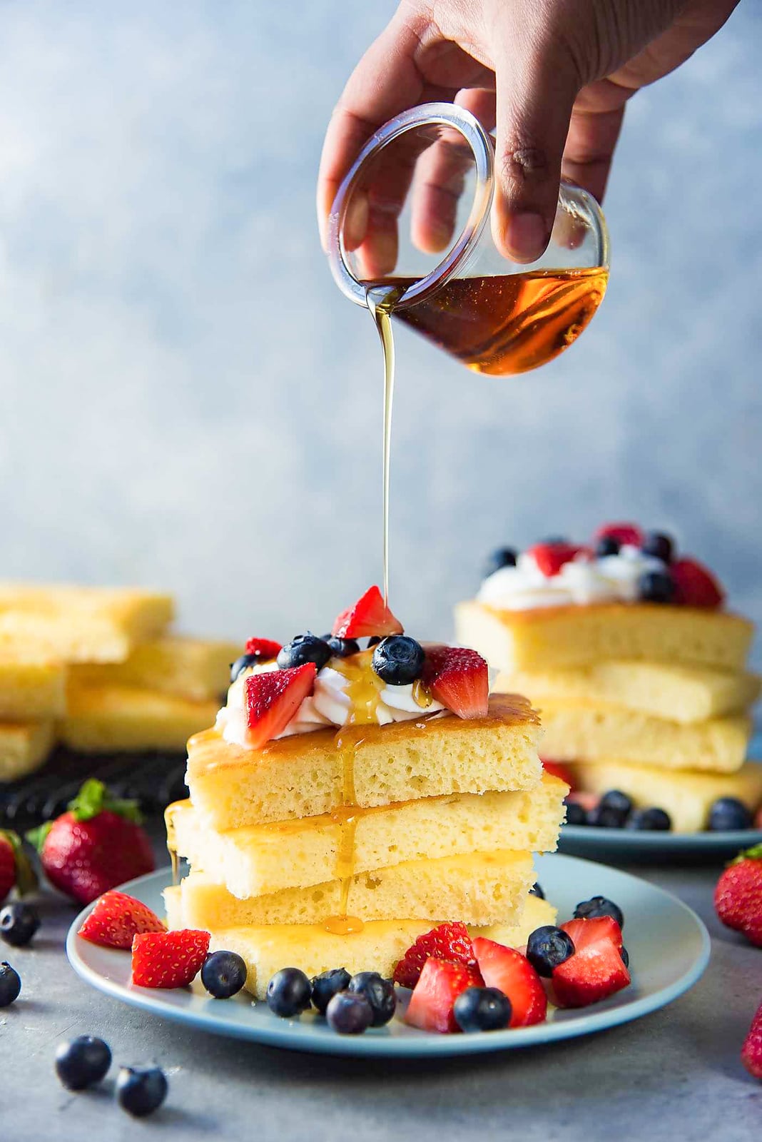 Sheet pan pancakes - Soft light and fluffy oven baked pancakes for breakfast or brunch. Perfect for a crowd, and easy to make. 