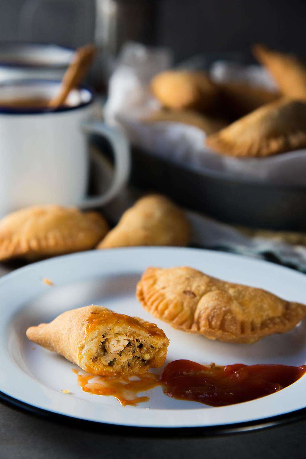 Sri Lankan Fish Patties - These fish empanadas are epic! A spicy fish filling inside perfectly flaky buttery crust. Perfect for snacking. Step by step instructions to make these Sri Lankan Patties. Freezer friendly too.
