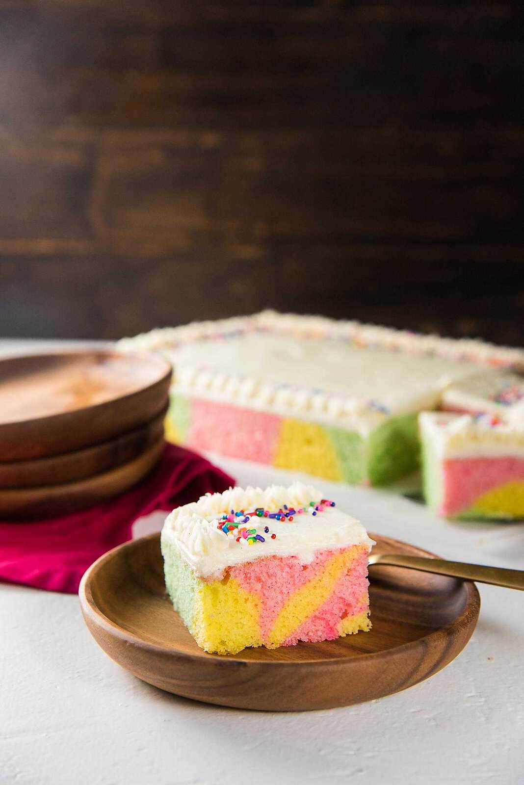 Swirled Pastel Cake (Sri Lankan Ribbon Cake) - a delicious vanilla cake with pastel swirls, and vanilla buttercream frosting. Perfect for birthdays, and celebrations like Easter! 