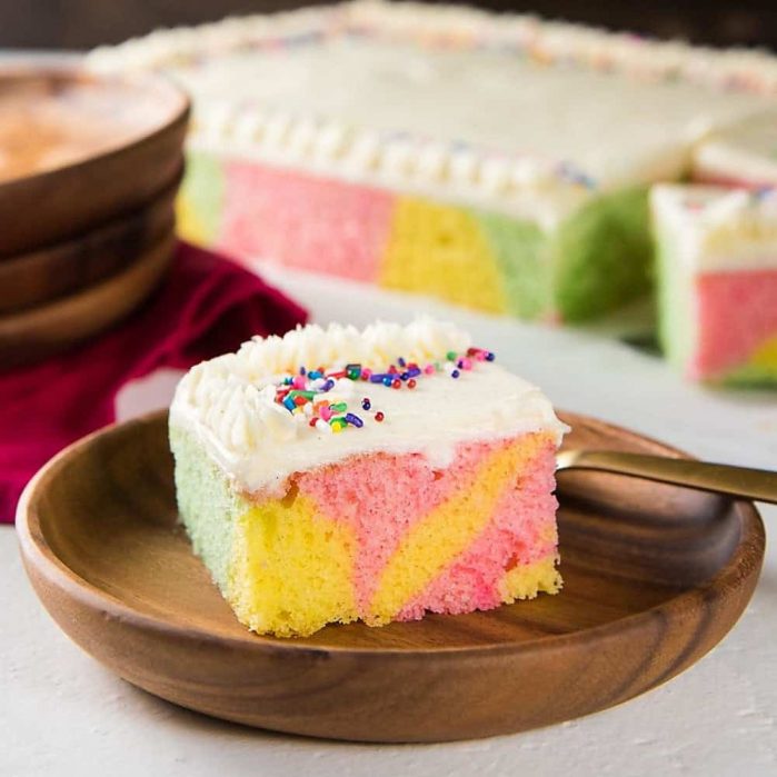 Swirled Pastel Cake (Ribbon Cake) - a delicious vanilla cake with pastel swirls, and vanilla buttercream frosting. Perfect for birthdays, and celebrations like Easter! 