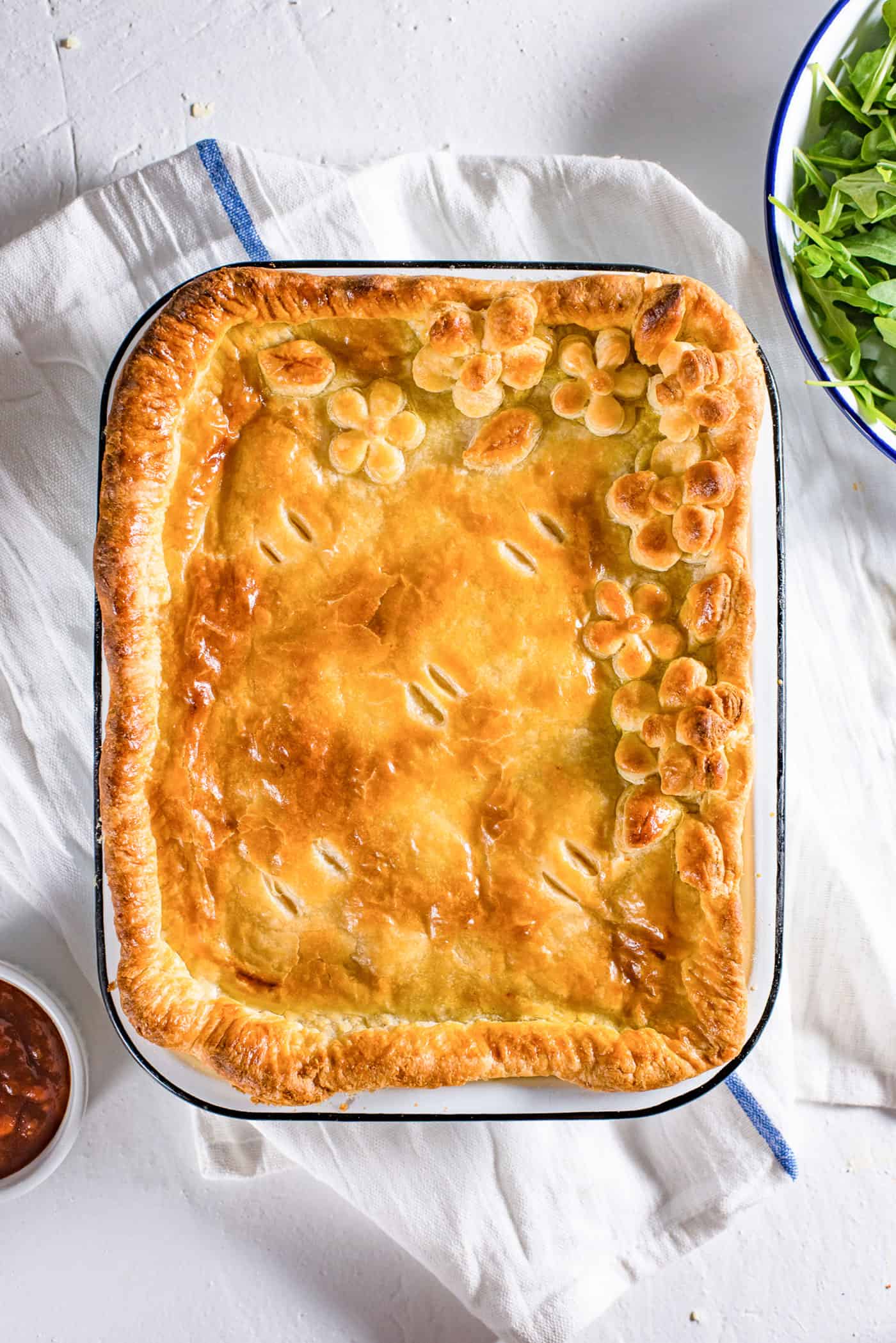 Ultimate Bacon and Egg Pie - A classic breakfast pie with Leeks, Cheese, Bacon and Eggs. Use extra puff pastry to create a design on top. Be creative and have fun with the designs, and don't forget the egg wash to make the crust shine.