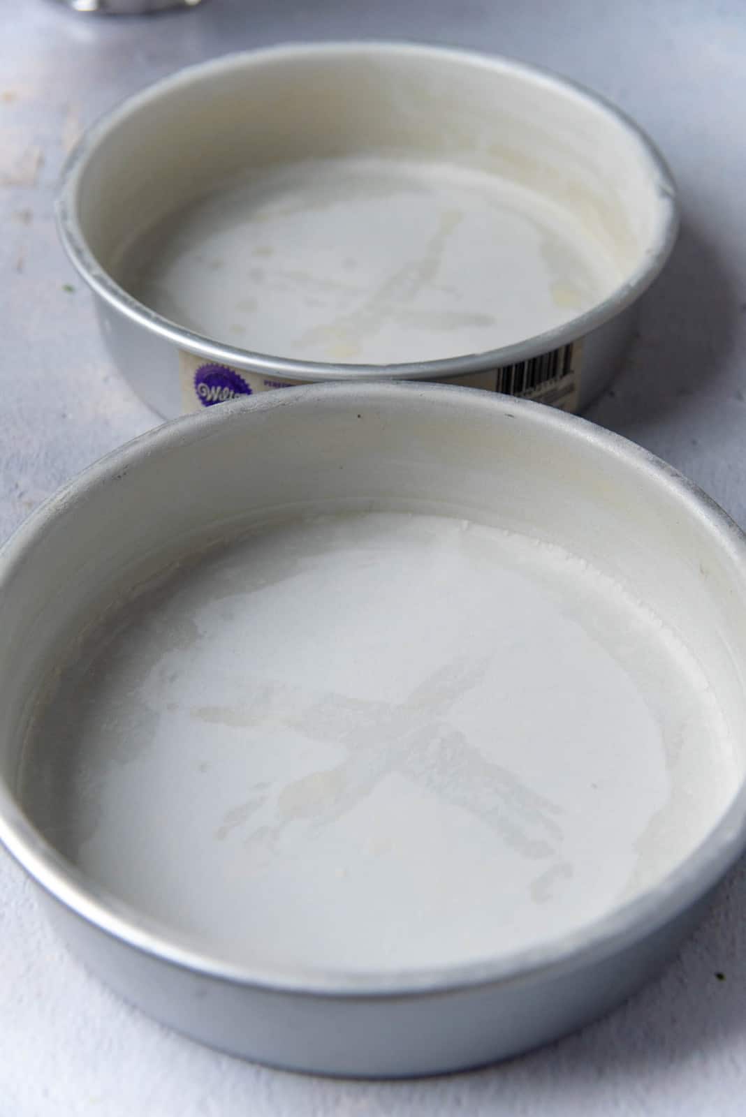 Cake pans prepared with parchment paper