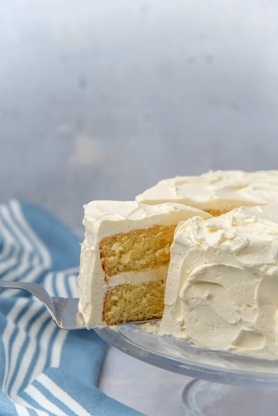 A slice of the cake being taken out of the cake