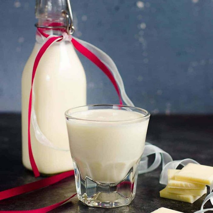 The BEST homemade white chocolate liqueur that is so easy to make, and absolutely delicious with extra white chocolate flavor! It's NOT sickly sweet, but still has the creamy taste of white chocolate! Far better than store bought too.